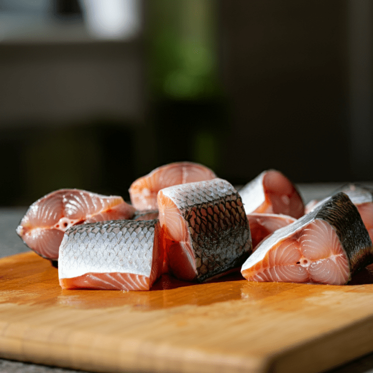 Brudet fish stew cutting fish